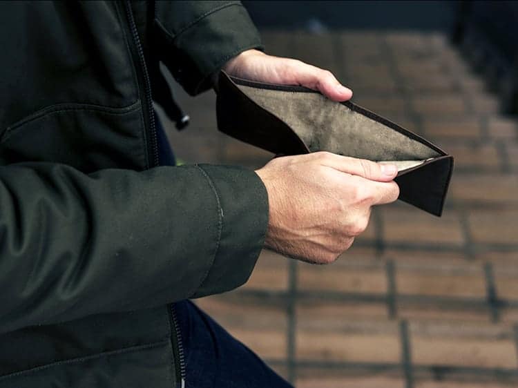 Man Hands Open Checking Empty Wallet Broke Out of Cash