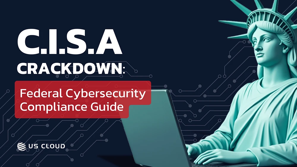Marketing banner showing the Statue of Liberty using a laptop against a dark blue background with circuit board patterns. Text reads 'C.I.S.A CRACKDOWN: Federal Cybersecurity Compliance Guide' with the US Cloud logo in the bottom left corner.