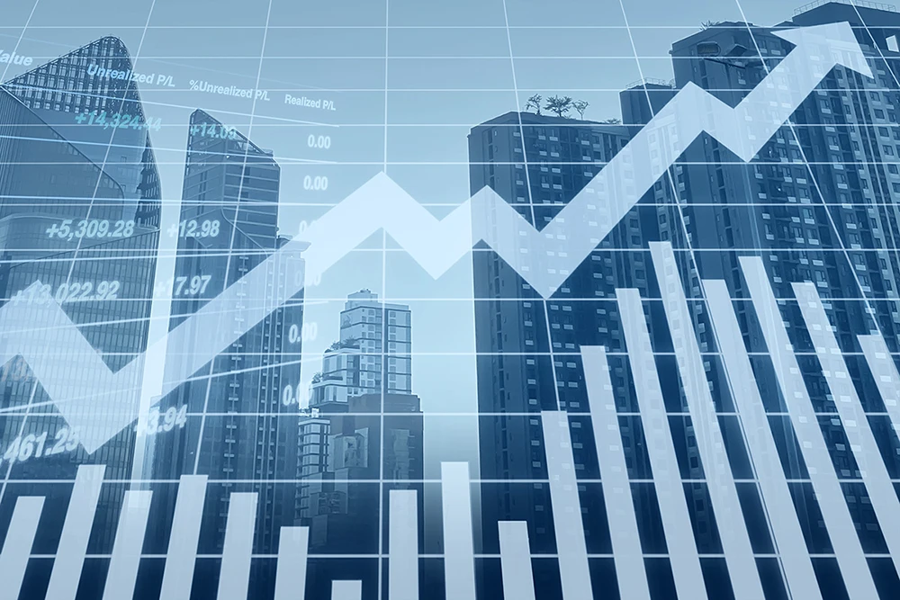 Graph with upward trend overlaid on city skyline, symbolizing financial recovery and cost-cutting strategy.
